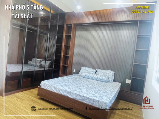 Phòng ngủ và không gian sinh hoạt của ngôi nhà phố mái Nhật 3 tầng 