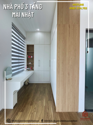 Phòng ngủ và không gian sinh hoạt của ngôi nhà phố mái Nhật 3 tầng 