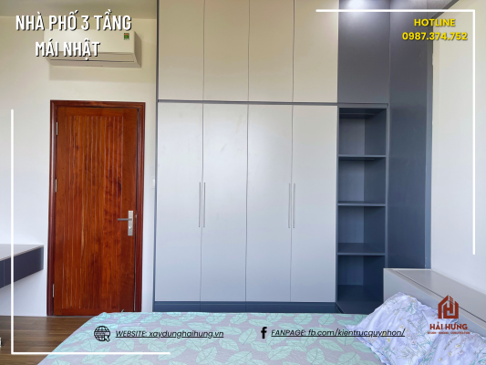Phòng ngủ và không gian sinh hoạt của ngôi nhà phố mái Nhật 3 tầng 