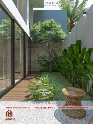 Vách tường ốp đá và khu vườn xanh mát của thiết kế villa mái nhật hiện đại 