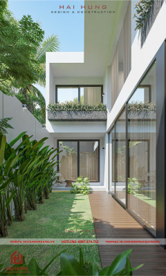 Vách tường ốp đá và khu vườn xanh mát của thiết kế villa mái nhật hiện đại 