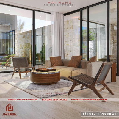 Phòng khách và khu bếp liên thông của thiết kế villa mái nhật đẹp hiện đại